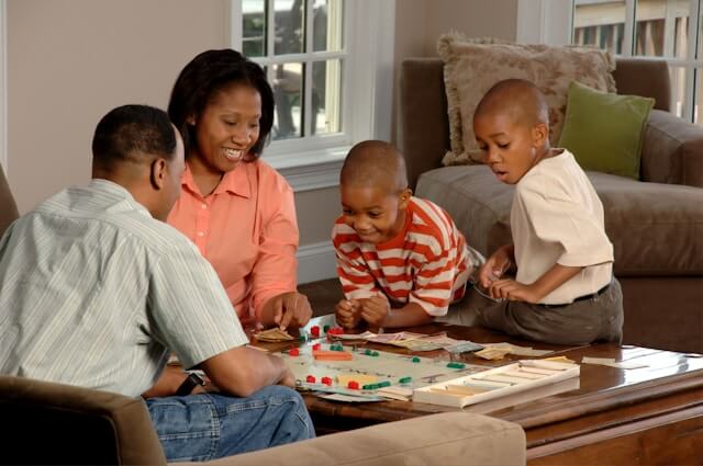 family playing board games | Good Hope Services